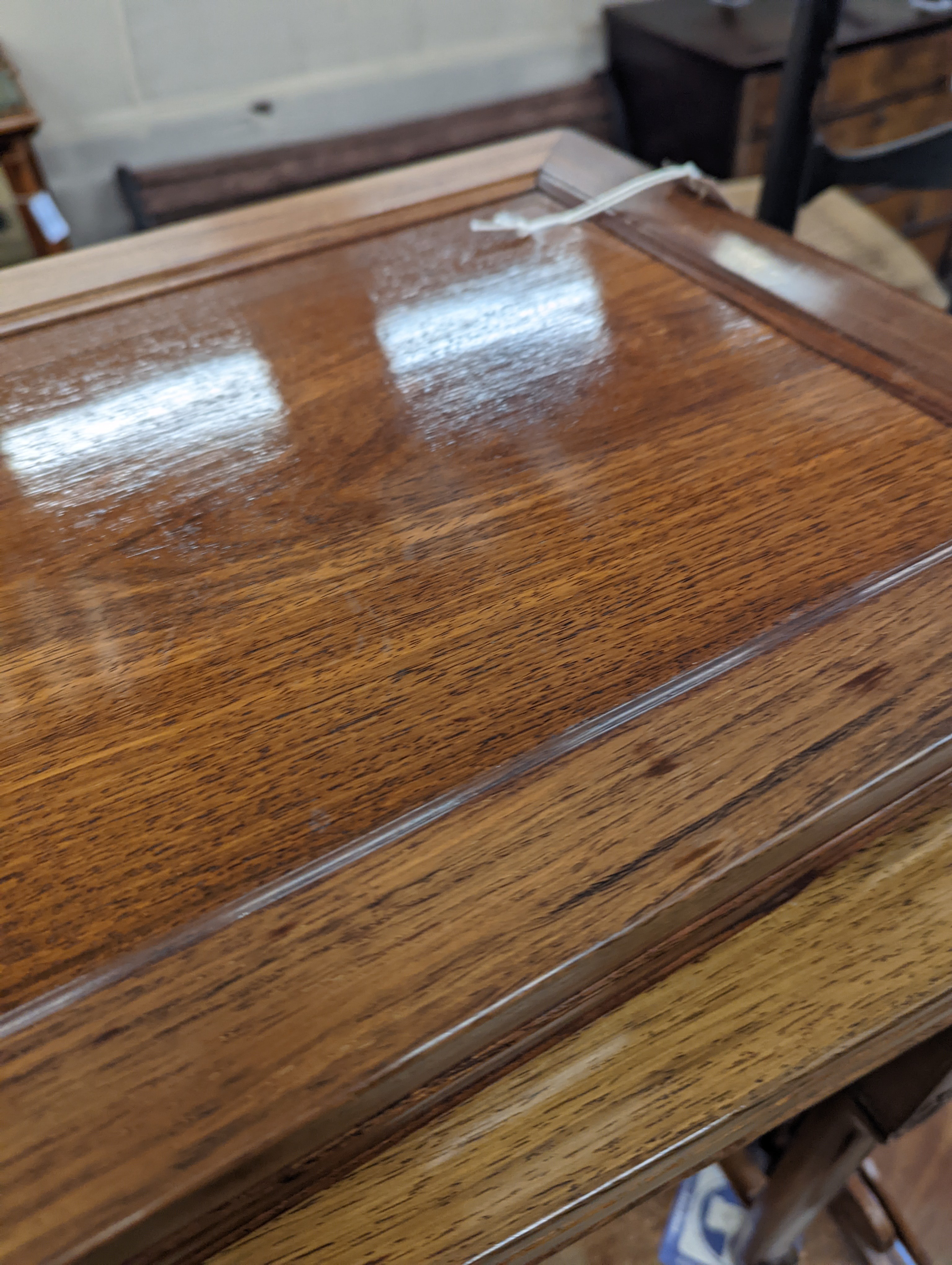 A nest of three Chinese rectangular tea tables, width 61cm, depth 36cm, height 66cm